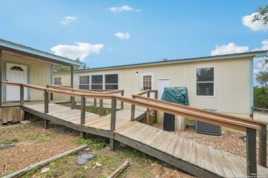 Set on over 1.3 acres in Lakehills, Texas, this 4-bedroom - photo 22