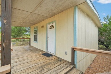 Set on over 1.3 acres in Lakehills, Texas, this 4-bedroom - photo 23