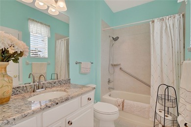 Welcome to 13960 Lake Mahogany Blvd - where peaceful lakefront