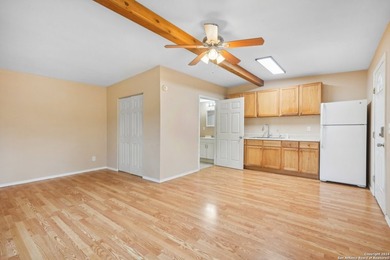 Set on over 1.3 acres in Lakehills, Texas, this 4-bedroom - photo 25