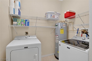 Welcome to 13960 Lake Mahogany Blvd - where peaceful lakefront