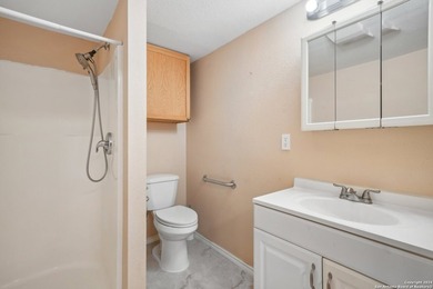 Set on over 1.3 acres in Lakehills, Texas, this 4-bedroom - photo 26