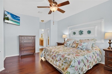 Welcome to 13960 Lake Mahogany Blvd - where peaceful lakefront