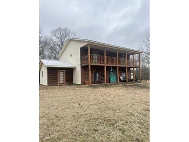 Tucked away in a peaceful country setting, this 3-bedroom - photo 1