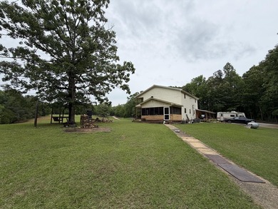 Tucked away in a peaceful country setting, this 3-bedroom - photo 2