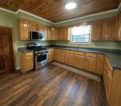 Tucked away in a peaceful country setting, this 3-bedroom - photo 6
