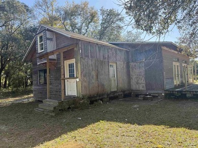 Quiet lot with home situated next to Corry Station. This - photo 1
