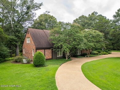 Set on 4.04 acres with pond frontage, this custom-built - photo 1