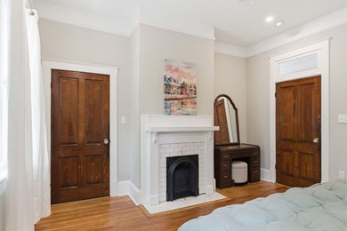 Nestled on charming Pitt Street in downtown Charleston, the - photo 18