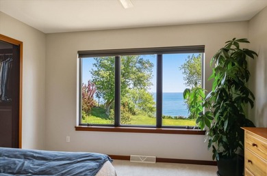 This prime Lake Michigan waterfront property on the sought-after - photo 19