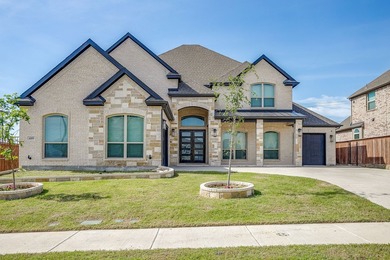 Nestled in a prime location just steps from the serene shores of - photo 1