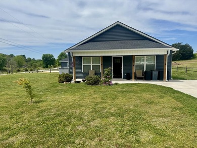 Located just outside the city limits of Benton, this nearly new - photo 1