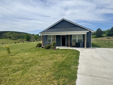 Located just outside the city limits of Benton, this nearly new - photo 2