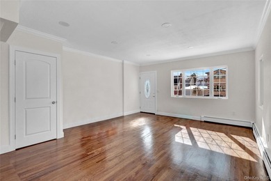 Move right into this renovated, legal two-family, Colonial-style - photo 3