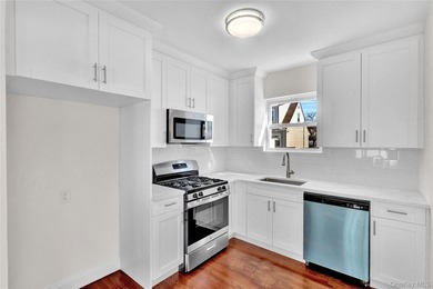 Move right into this renovated, legal two-family, Colonial-style - photo 6