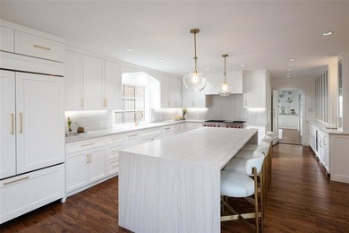 Located in Highland Park, this beautifully reimagined residence