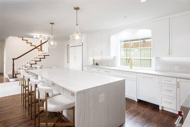 Located in Highland Park, this beautifully reimagined residence