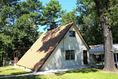 Welcome to this super cozy, cabin feeling, A-frame sitting at - photo 1