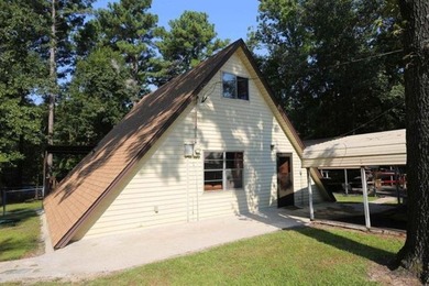 Welcome to this super cozy, cabin feeling, A-frame sitting at - photo 4