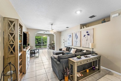 THIS METICULOUSLY MAINTAINED VILLA FLOWS EFFORTLESSLY FROM ROOM - photo 11