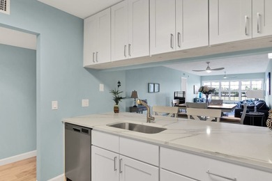Ease into the Florida lifestyle in this thoughtfully renovated - photo 12