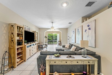 THIS METICULOUSLY MAINTAINED VILLA FLOWS EFFORTLESSLY FROM ROOM - photo 12