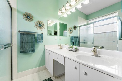 THIS METICULOUSLY MAINTAINED VILLA FLOWS EFFORTLESSLY FROM ROOM - photo 22