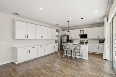 Discover comfort, convenience, and true Florida living in this - photo 3