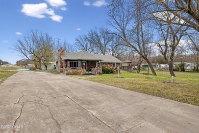 Welcome home to this solid 3-bedroom, 2.5-bath brick home - photo 1