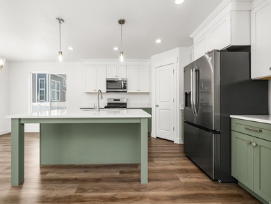 Hardly lived-in and move-in ready, this 4-bedroom, 2.5-bath home - photo 9