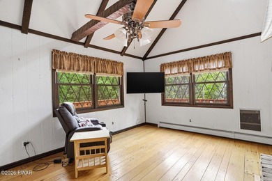 A massive floor-to-ceiling brick fireplace, rumored to contain 3 - photo 10