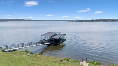Few homes on Grand Lake offer a setting like this. Positioned on - photo 6