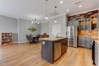 Enjoy downtown Greensboro living from this beautifully appointed - photo 11