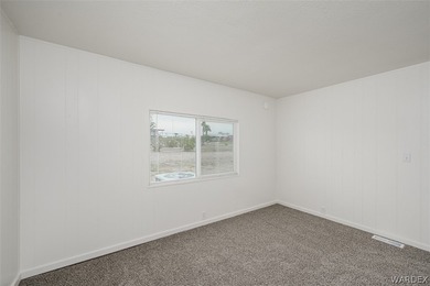 Located in the Central area of Bullhead City, this Manufactured - photo 36