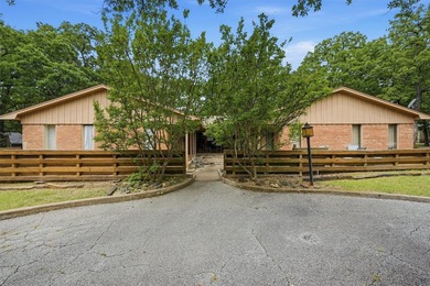 Tucked beneath the trees in the desirable Tanglewood community - photo 3