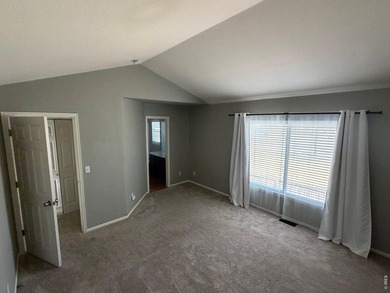 This bright and inviting home features vaulted ceilings and a - photo 14