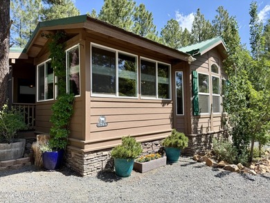 Escape to mountain living in this charming retreat surrounded by - photo 1