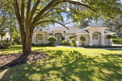 THIS BEAUTIFULLY UPDATED THREE-BEDROOM HOME IN OSPREY COVE IS - photo 2