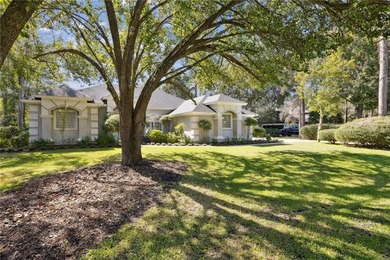 THIS BEAUTIFULLY UPDATED THREE-BEDROOM HOME IN OSPREY COVE IS - photo 4