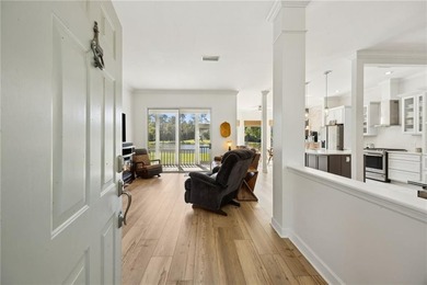 THIS BEAUTIFULLY UPDATED THREE-BEDROOM HOME IN OSPREY COVE IS - photo 9