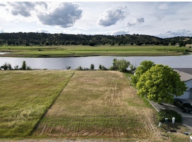 Build your dream home on the water in the gated community of - photo 1
