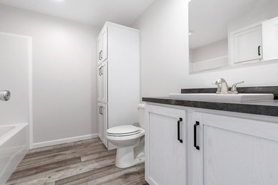 Experience the simplicity of single-level living in this - photo 8
