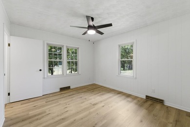 Just minutes from Stockton Lake, this move-in ready home sits on - photo 18