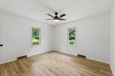 Just minutes from Stockton Lake, this move-in ready home sits on - photo 21