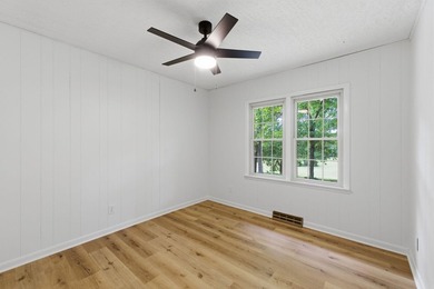 Just minutes from Stockton Lake, this move-in ready home sits on - photo 24