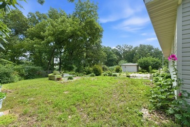 Just minutes from Stockton Lake, this move-in ready home sits on - photo 30