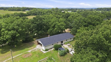 Just minutes from Stockton Lake, this move-in ready home sits on - photo 35