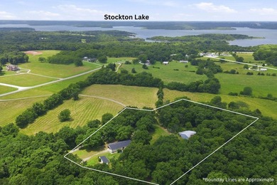 Just minutes from Stockton Lake, this move-in ready home sits on - photo 36