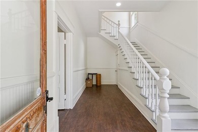 Triplex offering three apartments in this three level home. The - photo 3