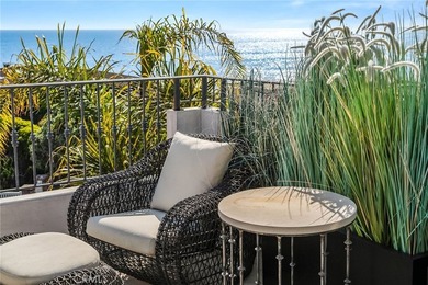 Perched above the steps to the famed Woods Cove beach, in a town - photo 23
